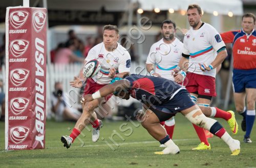 USA Rugby's JOE TAUFETE'E (16) tackles Russia Rugby's DMITRY GERASIMOV (12)