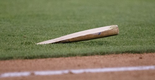 A broken bat flew half way down the third baseline and stuck into the ground during the MiLB game